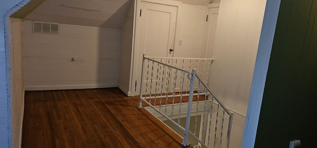 24 Mulberry St, Savanna, IL 61074 - corridor with an upstairs landing and dark wood-style floors