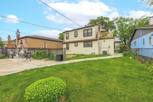 4918 S Luna Ave, Chicago, IL 60638 - rear view of house with a patio area and a fenced backyard