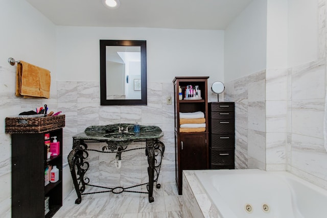 1318 N Menard Ave, Chicago, IL 60651 - full bath featuring tile walls, a whirlpool tub, a wainscoted wall, and marble finish flooring