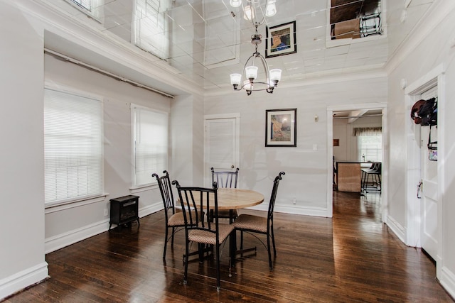1318 N Menard Ave, Chicago, IL 60651 - dining area featuring ornamental molding, a chandelier, and wood-type flooring