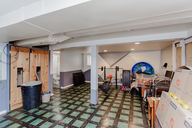 1318 N Menard Ave, Chicago, IL 60651 - finished below grade area with tile patterned floors and stairs