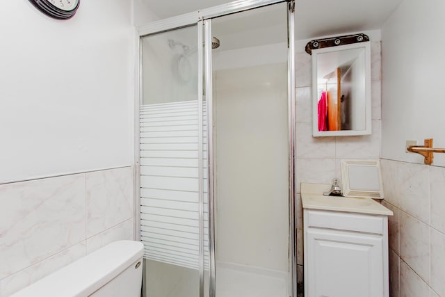 1318 N Menard Ave, Chicago, IL 60651 - bathroom with tile walls, a shower stall, and vanity