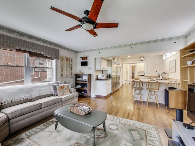 125 Thatcher Ave, River Forest, IL 60305 - living area with light wood-type flooring and a ceiling fan