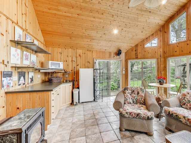125 Thatcher Ave, River Forest, IL 60305 - living room with wood walls, wooden ceiling, high vaulted ceiling, and ceiling fan