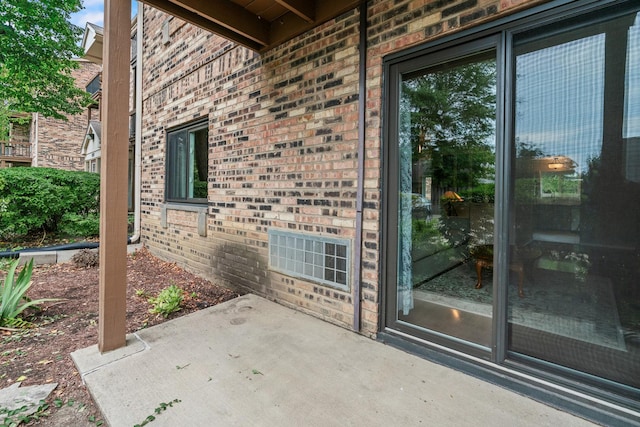 2215 Nichols Rd Unit B, Arlington Heights, IL 60004 - entrance to property with brick siding and a patio area