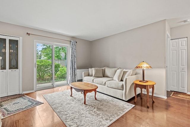 2215 Nichols Rd Unit B, Arlington Heights, IL 60004 - living area featuring light wood-type flooring and baseboards