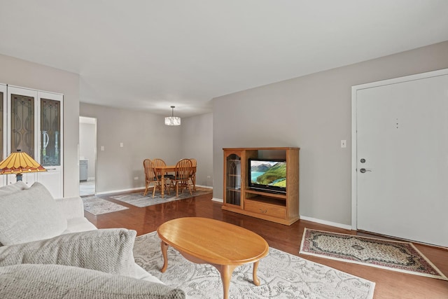 2215 Nichols Rd Unit B, Arlington Heights, IL 60004 - living room with wood finished floors and a chandelier