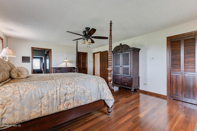 10766 E 7000n Rd, Grant Park, IL 60940 - bedroom with wood finished floors, a textured ceiling, and ceiling fan