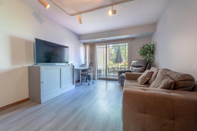 29W400 Thornwood Ln, Warrenville, IL 60555 - living area featuring rail lighting, light wood-style floors, and a desk