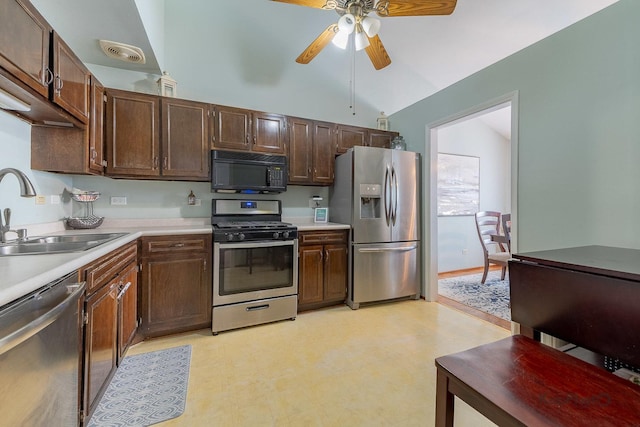 29W400 Thornwood Ln, Warrenville, IL 60555 - kitchen with stainless steel appliances, light countertops, ceiling fan, and light floors