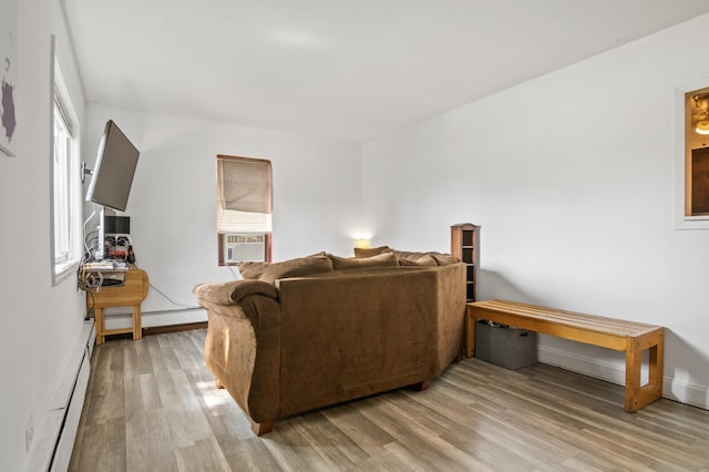 116 S Harold Ave, Northlake, IL 60164 - living room featuring a baseboard radiator, light wood-style flooring, and cooling unit