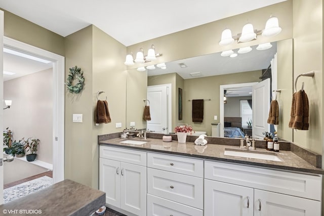 3109 N Oketo Ave, Chicago, IL 60707 - ensuite bathroom featuring double vanity and ceiling fan