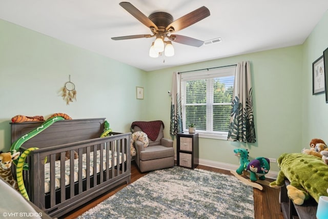 3109 N Oketo Ave, Chicago, IL 60707 - bedroom with wood finished floors and a ceiling fan