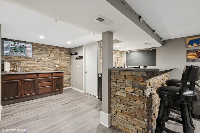 3109 N Oketo Ave, Chicago, IL 60707 - indoor wet bar with light wood-style flooring and recessed lighting