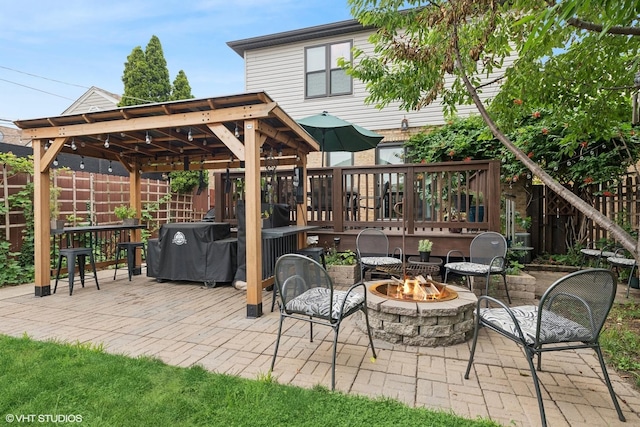 3109 N Oketo Ave, Chicago, IL 60707 - view of patio featuring an outdoor fire pit, a gazebo, and grilling area