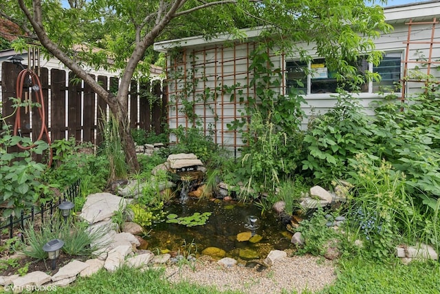 3109 N Oketo Ave, Chicago, IL 60707 - view of yard featuring a small pond