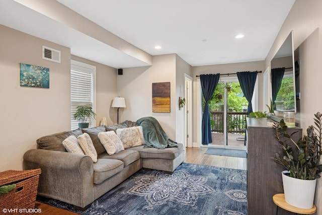 3109 N Oketo Ave, Chicago, IL 60707 - living area featuring wood finished floors and recessed lighting