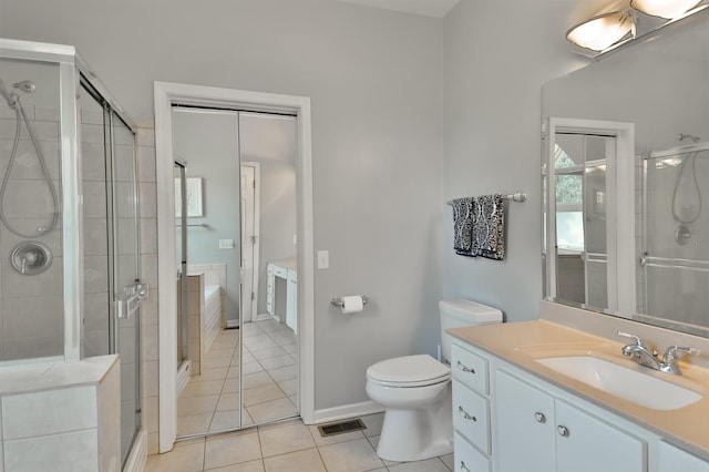 930 Candlewick Dr NE, Poplar Grove, IL 61065 - full bath with tile patterned floors, vanity, and a stall shower