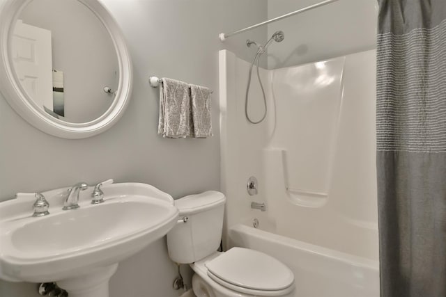 930 Candlewick Dr NE, Poplar Grove, IL 61065 - bathroom featuring shower / bath combination with curtain and a sink