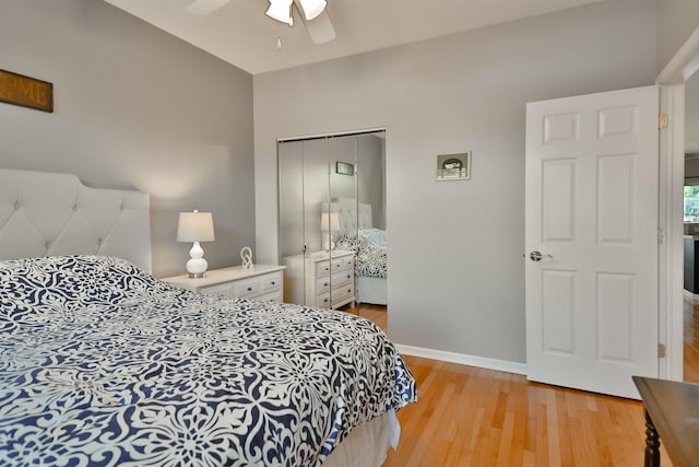 930 Candlewick Dr NE, Poplar Grove, IL 61065 - bedroom featuring light wood-style flooring, a closet, and a ceiling fan