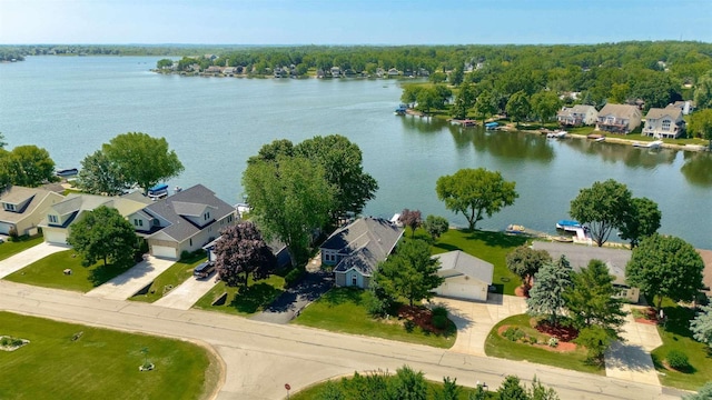 930 Candlewick Dr NE, Poplar Grove, IL 61065 - aerial perspective of suburban area with a large body of water