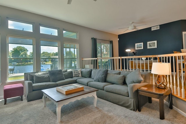 930 Candlewick Dr NE, Poplar Grove, IL 61065 - living room with a ceiling fan, a water view, and carpet