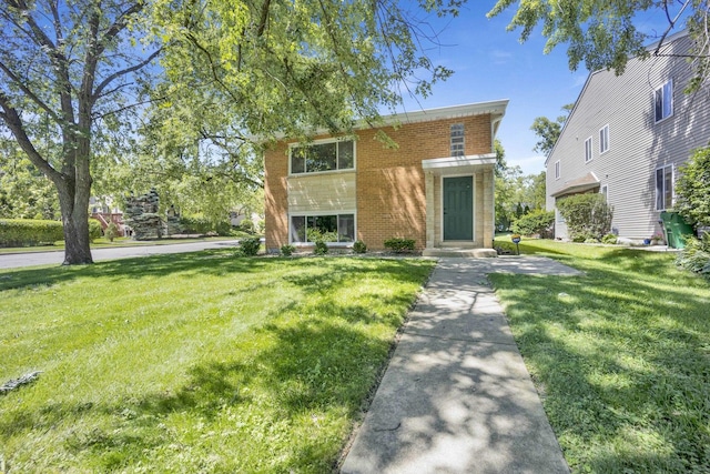 27W180 Cooley Ave, Winfield, IL 60190 - view of front of house with brick siding and a front lawn