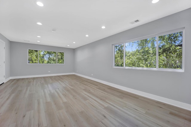 27W180 Cooley Ave, Winfield, IL 60190 - spare room featuring healthy amount of natural light, recessed lighting, and light wood finished floors