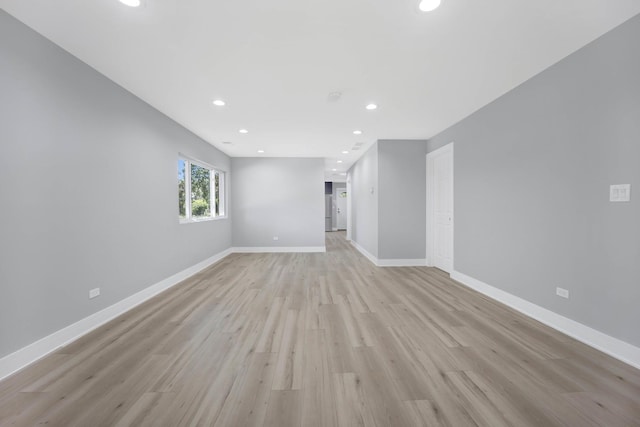 27W180 Cooley Ave, Winfield, IL 60190 - unfurnished living room featuring light wood-style flooring and recessed lighting