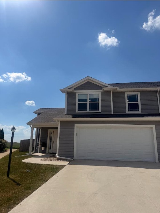 3938 Summer Sage Ct, Champaign, IL 61822 - view of front of property featuring an attached garage and driveway