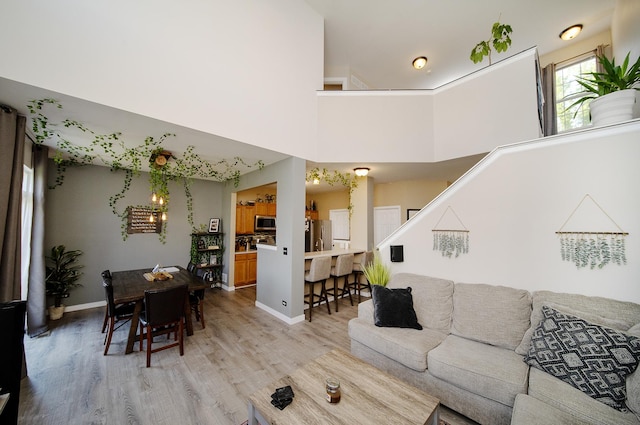 610 N Red Deer Rd, Round Lake, IL 60073 - living room with light wood-style floors and stairway