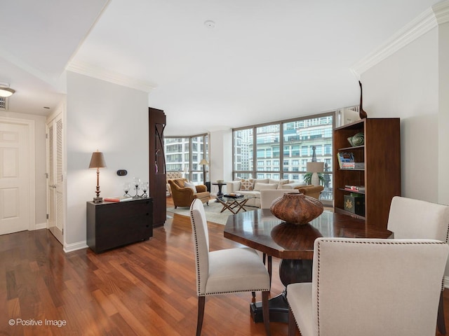 21 E Huron St Unit 1106, Chicago, IL 60611 - dining room featuring ornamental molding and wood finished floors