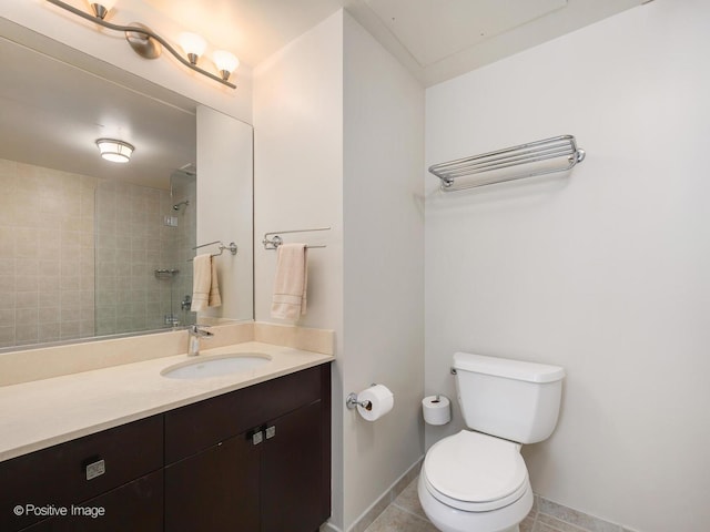 21 E Huron St Unit 1106, Chicago, IL 60611 - bathroom featuring vanity, tiled shower, and tile patterned floors