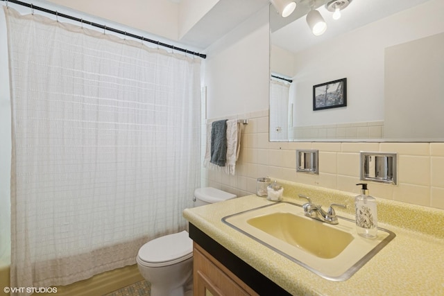 1 E Milburn Ave, Mount Prospect, IL 60056 - bathroom featuring tile walls and vanity