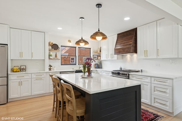 1 E Milburn Ave, Mount Prospect, IL 60056 - kitchen with open shelves, premium range hood, stainless steel appliances, white cabinets, and recessed lighting