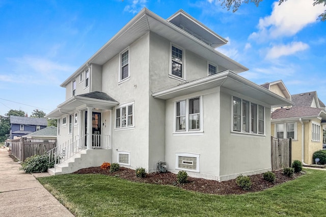 619 N 4th Ave, Maywood, IL 60153 - view of home's exterior featuring stucco siding
