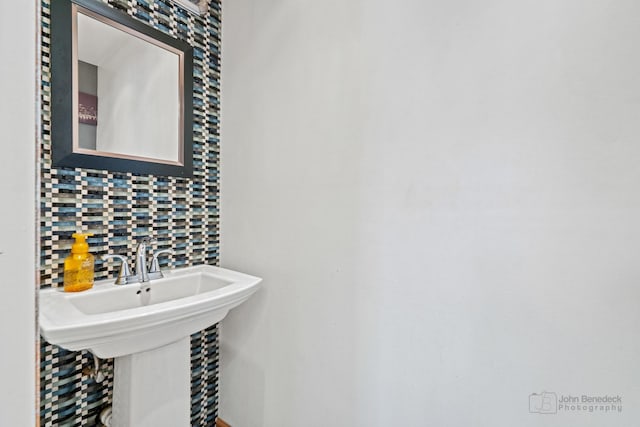 619 N 4th Ave, Maywood, IL 60153 - bathroom featuring tasteful backsplash and a sink