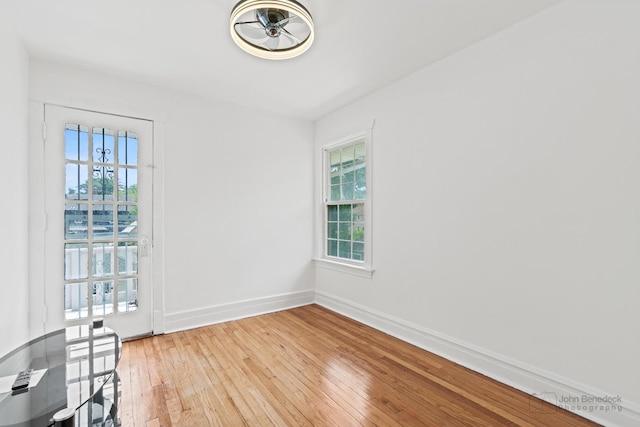 619 N 4th Ave, Maywood, IL 60153 - unfurnished room featuring light wood finished floors and baseboards
