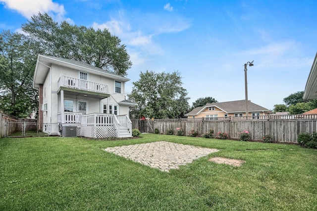 619 N 4th Ave, Maywood, IL 60153 - fenced backyard with a balcony, a patio area, and a deck