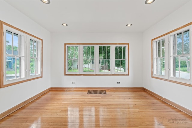 619 N 4th Ave, Maywood, IL 60153 - empty room featuring healthy amount of natural light, light wood finished floors, and recessed lighting