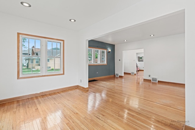 619 N 4th Ave, Maywood, IL 60153 - spare room with light wood-style flooring and recessed lighting