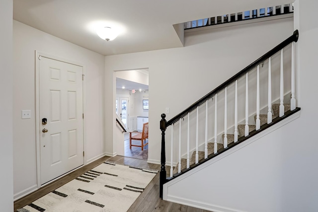 458 Bower Ln, Oswego, IL 60543 - entryway with wood finished floors and stairs