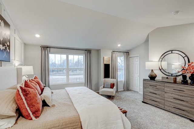 458 Bower Ln, Oswego, IL 60543 - bedroom with light colored carpet, multiple windows, lofted ceiling, and recessed lighting