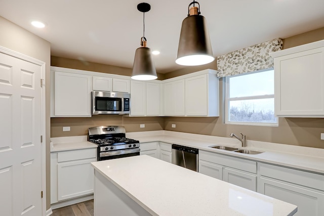 458 Bower Ln, Oswego, IL 60543 - kitchen with appliances with stainless steel finishes, light countertops, white cabinets, and recessed lighting