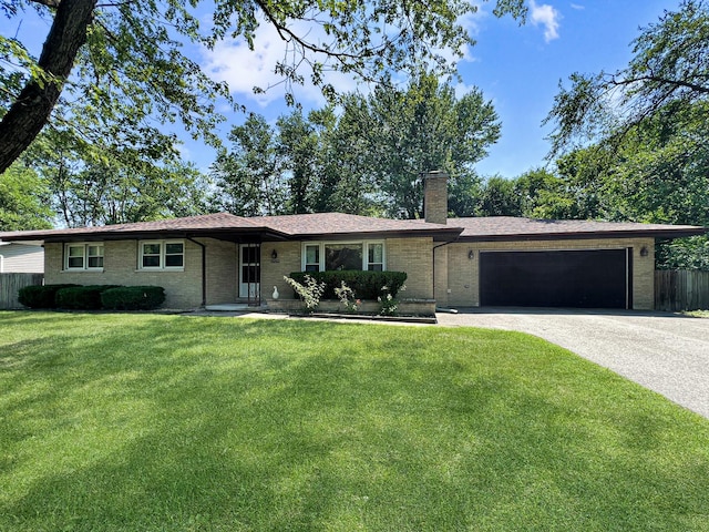 17225 Laflin Ave, East Hazel Crest, IL 60429 - single story home with a chimney, an attached garage, brick siding, and driveway