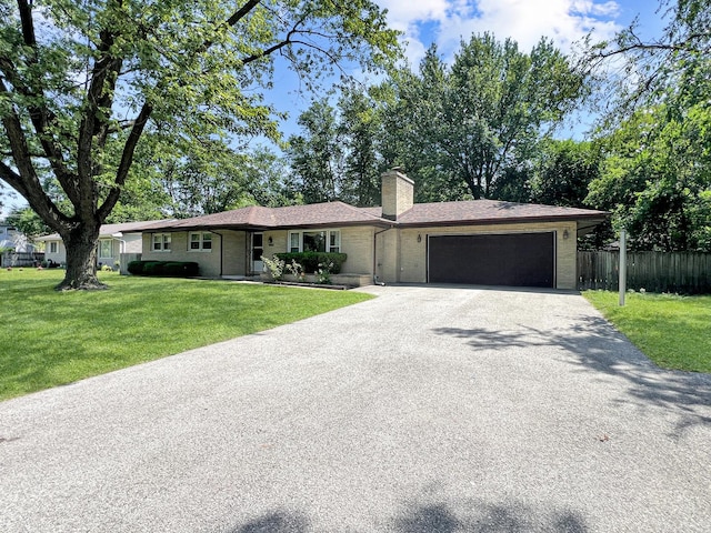 17225 Laflin Ave, East Hazel Crest, IL 60429 - ranch-style home featuring a garage, a chimney, asphalt driveway, and brick siding