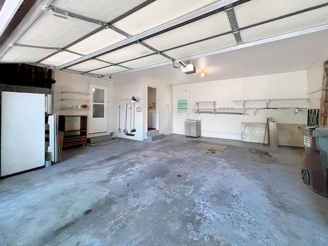 17225 Laflin Ave, East Hazel Crest, IL 60429 - garage with a garage door opener and washer / clothes dryer