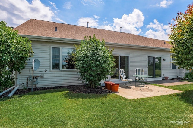 21610 W Empress Ln, Plainfield, IL 60544 - rear view of property with a yard, a patio area, and roof with shingles