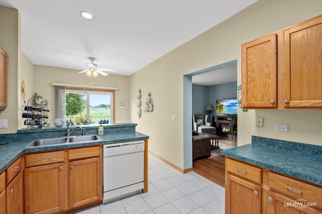 21610 W Empress Ln, Plainfield, IL 60544 - kitchen with white dishwasher, light tile patterned floors, dark countertops, ceiling fan, and recessed lighting