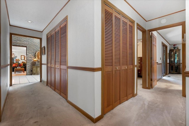 25316 E 1100 N Rd, Downs, IL 61736 - corridor featuring light colored carpet and ornamental molding